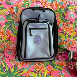 American girl carrier, Gray and Black Backpack with Purple Logo